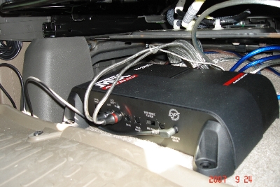 The small amp fits under the driver's seat